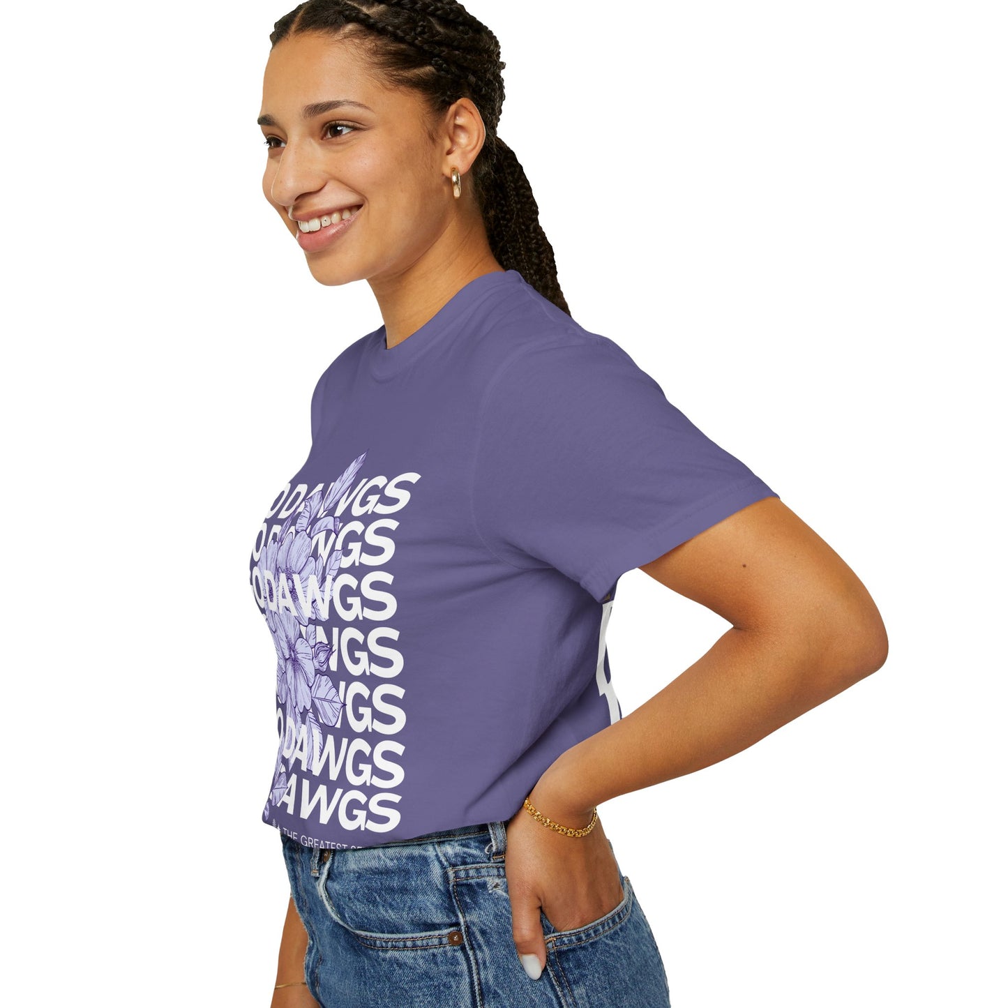 Woman wearing a purple t-shirt with text on a white background